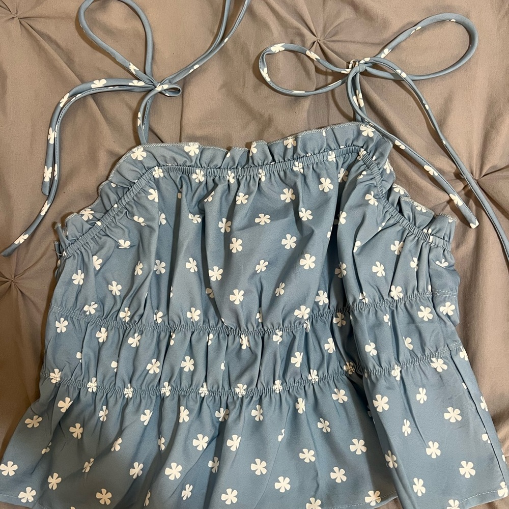 Super cute blue floral shoulder tie top size L
